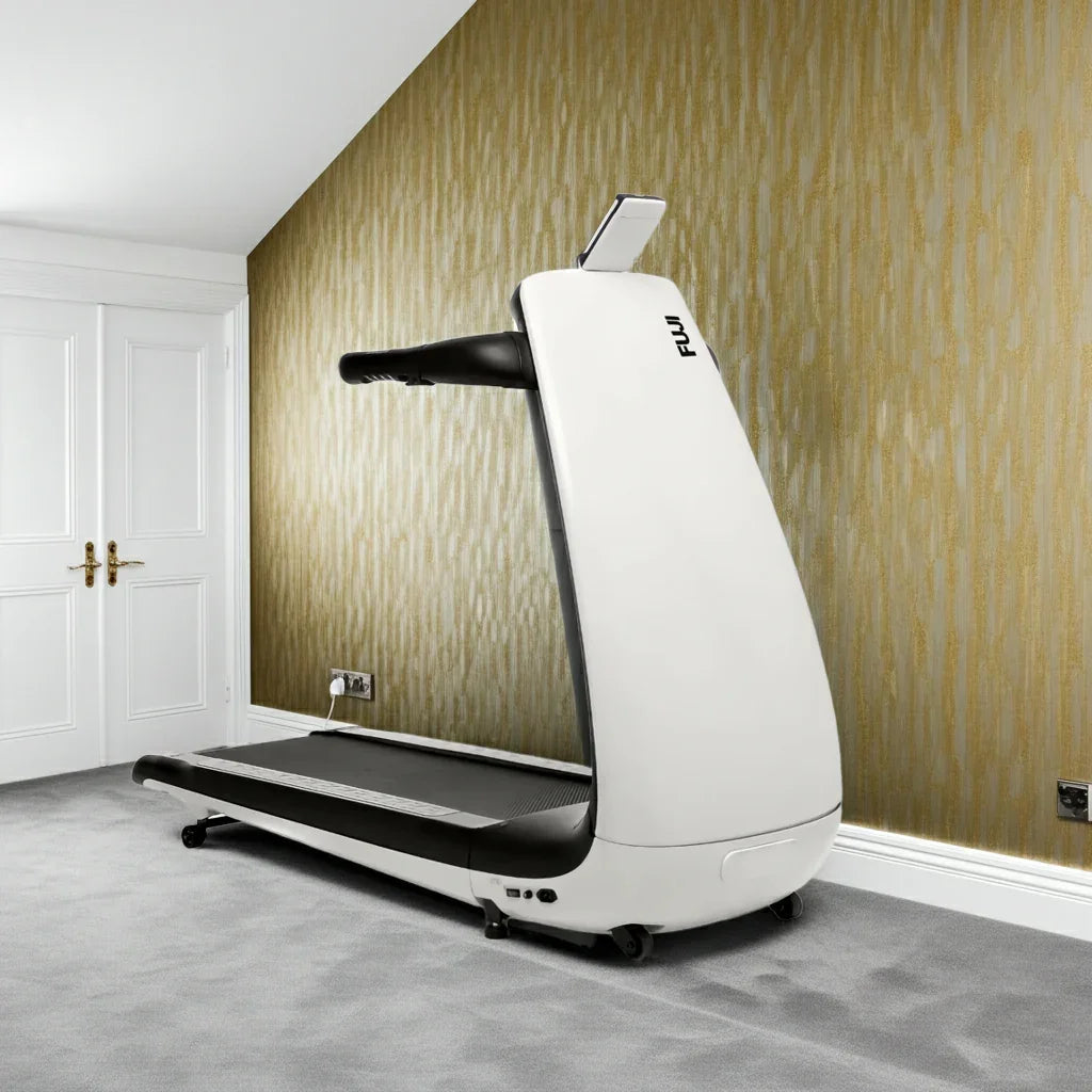 Fuji cushioned foldable treadmill for home gym on grey carpet in modern room
