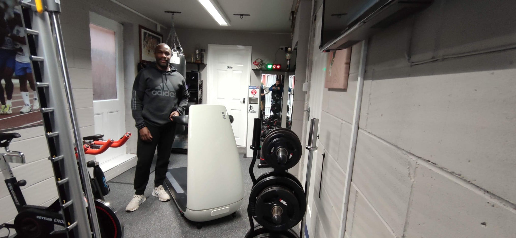 Derek Redmond with His BeHealthy Treadmill White