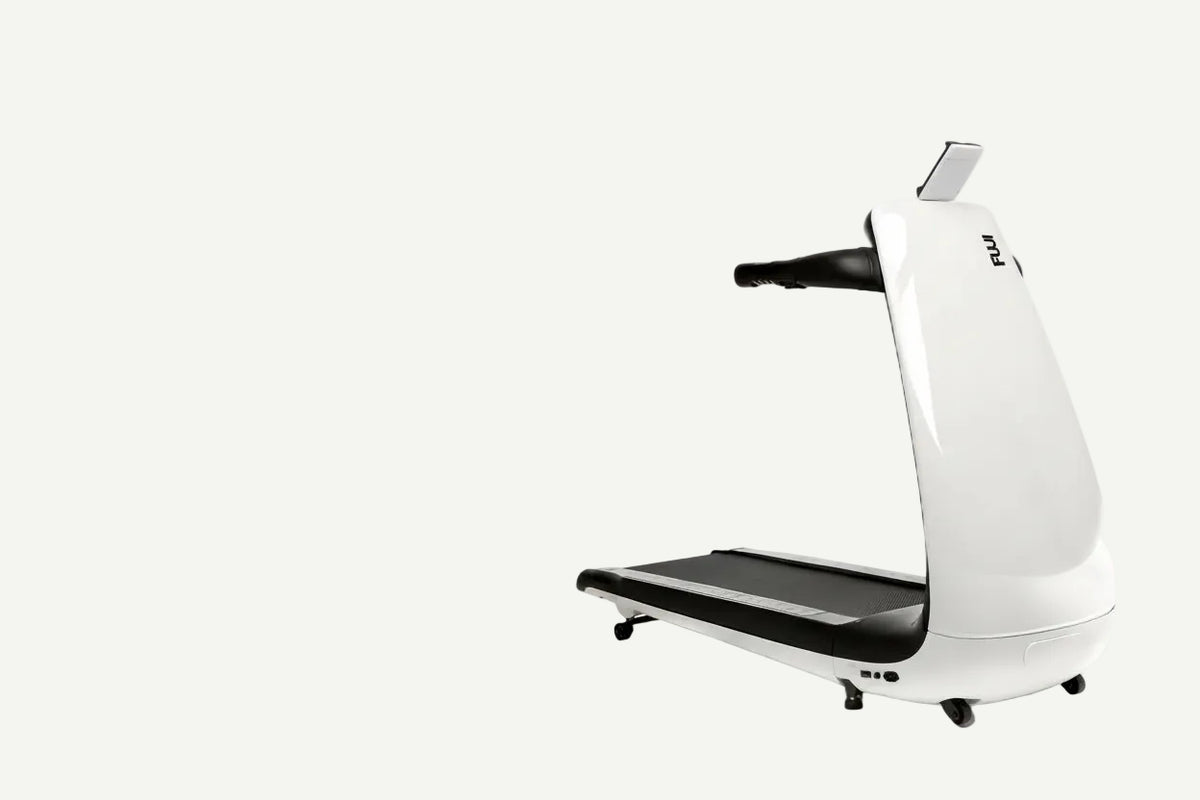 White treadmill with black platform on a white background