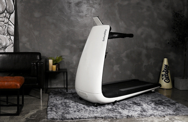 Compact ergonomic treadmill in a modern home gym