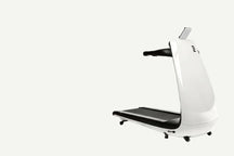 White treadmill with black platform on a white background